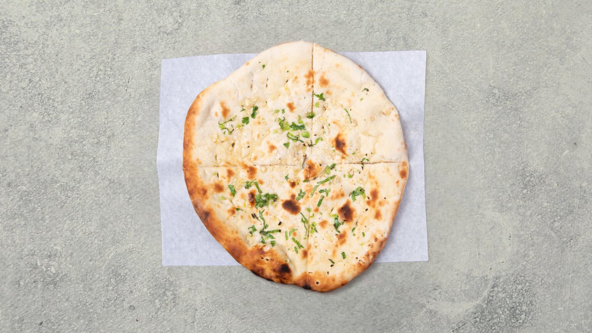 24d32e46-77f9-11ee-9af9-b6922d080ff8_garlic_naan_photoroom.png