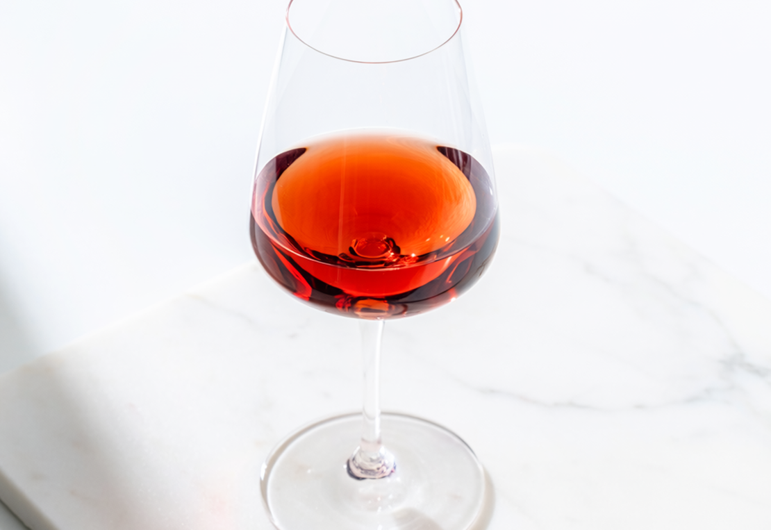 Firefly Pinot Noir A Glass Of Red Wine On A White Marble Surface, Soft Natural Light, Food 49606