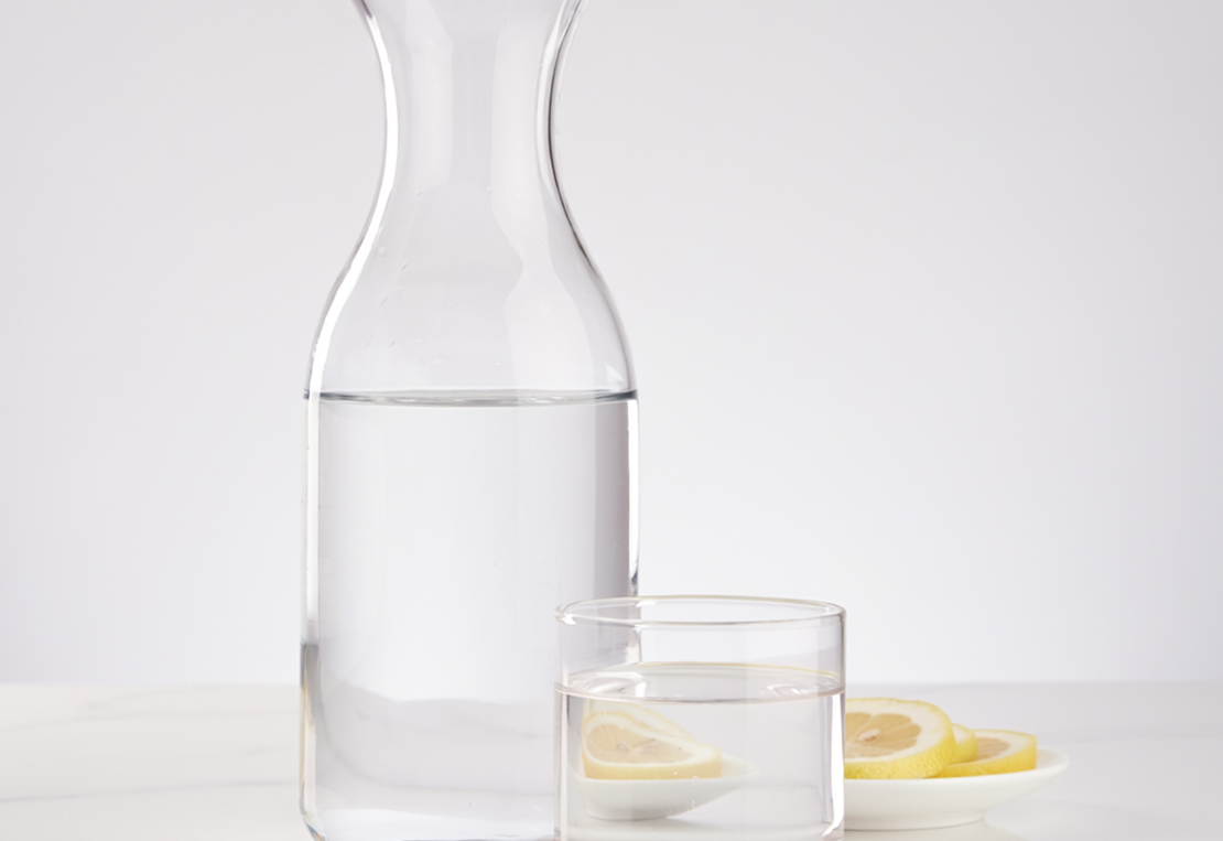 Firefly Make A Water Carafe As Reference On White Marble, Soft Studio Light, Food Photograph 661280